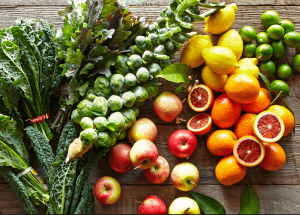 a group of fruits and vegetables on a wood surface Healthy Weight Loss Diets Twickenham