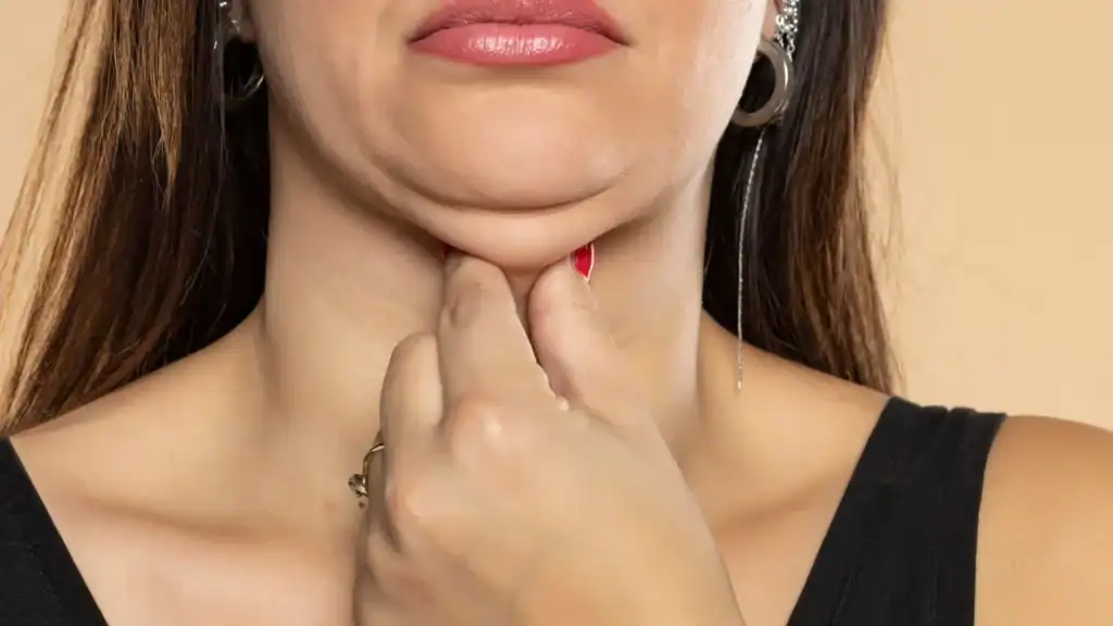 An image of a woman with double chin, sad, worried : Non Surgical Double Chin Removal Treatment in Twickenham, UK